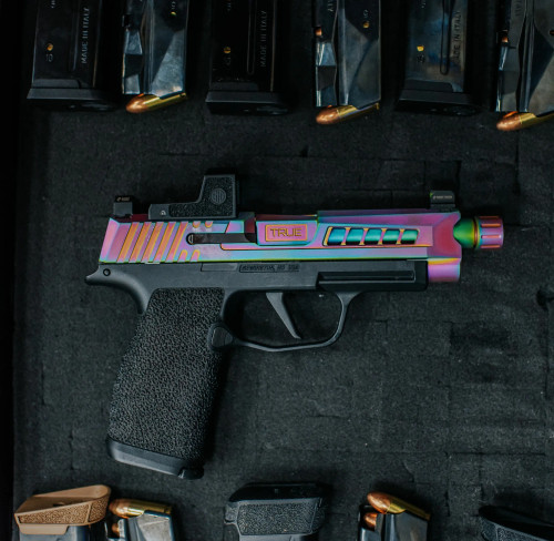 True Precision Sig Sauer P365 XL with spectrum slide, and threaded barrel.