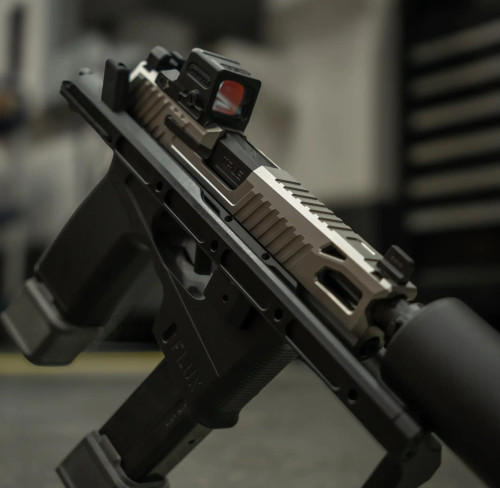 True Precision P365 Flux Extended 6.5" barrel with a black suppressor