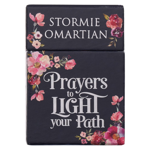 Seek God's comforting presence in any dark moment and allow the powerful prayers in the Prayers To Light Your Path Box of Blessings to light up the darkness around you.

The deep purple cover and tight-fitting lid of the Box of Blessings are decorated with swags of pink flowers placed in opposing corners. The title is presented in reflective silver foiled letters.

Prayers To Light Your Path 

Each of the cards contained in the box of blessings is printed in full color on both sides. The front of each card features a creamy white background grounded by a swag of pink florals and a heartfelt prayer. You will find a deep purple background with a pink corner floral design and a supporting Scripture verse on the back of each card.