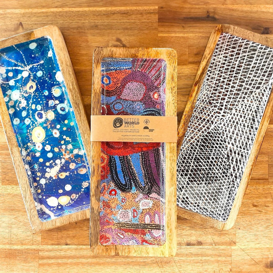Versatile wooden trays featuring design by talented Aboriginal artists of Australia Versatile wooden trays featuring design by talented Aboriginal artists of Australia