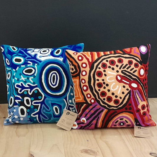 Hand made wool cushion covers that feature Aboriginal designs