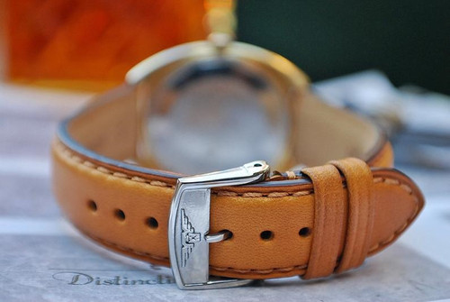 Longines stainless steel buckle on 18mm tan leather strap