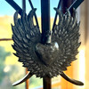 winged sacred heart, sacred heart wall art, Haitian metal art, crowned heart decor, angel wings wall sculpture, handmade Haitian sculpture