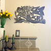 Celebrate the beauty and mystery of the sea with this captivating handcrafted Mermaid Metal Wall Sculpture, created in Haiti from recycled steel oil drums. This enchanting design features a graceful mermaid swimming among tropical fish, flowing currents, and decorative marine-inspired scrollwork, blending Caribbean folklore with traditional Haitian artistry.
Every detail is individually hand-cut, hammered, embossed, and shaped by skilled artisans using techniques passed down through generations. The mermaid's flowing hair transforms into swirling ocean currents adorned with delicate crosses and decorative motifs, while textured scales and finely detailed fish create remarkable depth and movement throughout the composition.
Mermaids have long symbolized beauty, mystery, freedom, and a deep connection to the ocean. Combined with the vibrant marine life surrounding her, this sculpture evokes the magic of tropical waters and the rich storytelling traditions of the Caribbean.
Perfect for coastal homes, beach cottages, lake houses, nautical interiors, tropical retreats, or anyone who loves ocean-inspired décor, this striking wall sculpture serves as a unique statement piece and conversation starter.