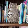 Hand-cut steel wall art featuring an owl and skull design with flowers, 11.5 inches, from Haiti.