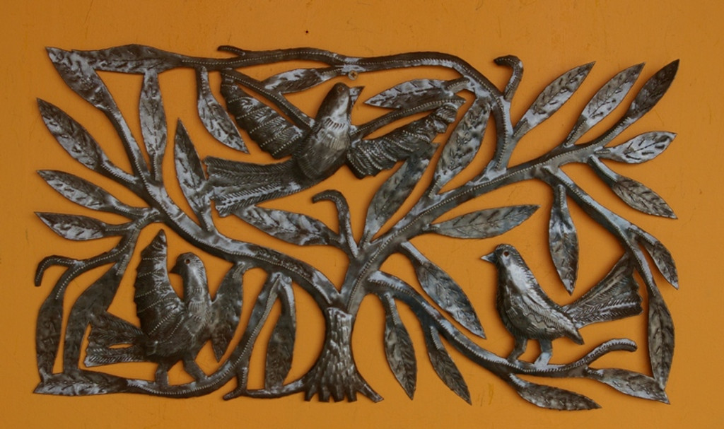 it's cactus metal art haiti, tree with birds,