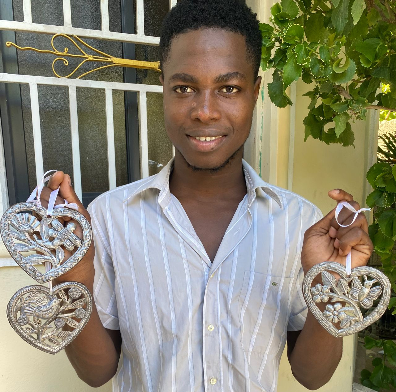 heart-shaped ornament Haiti, handmade dragonfly art, nature-inspired ornament, small metal accent