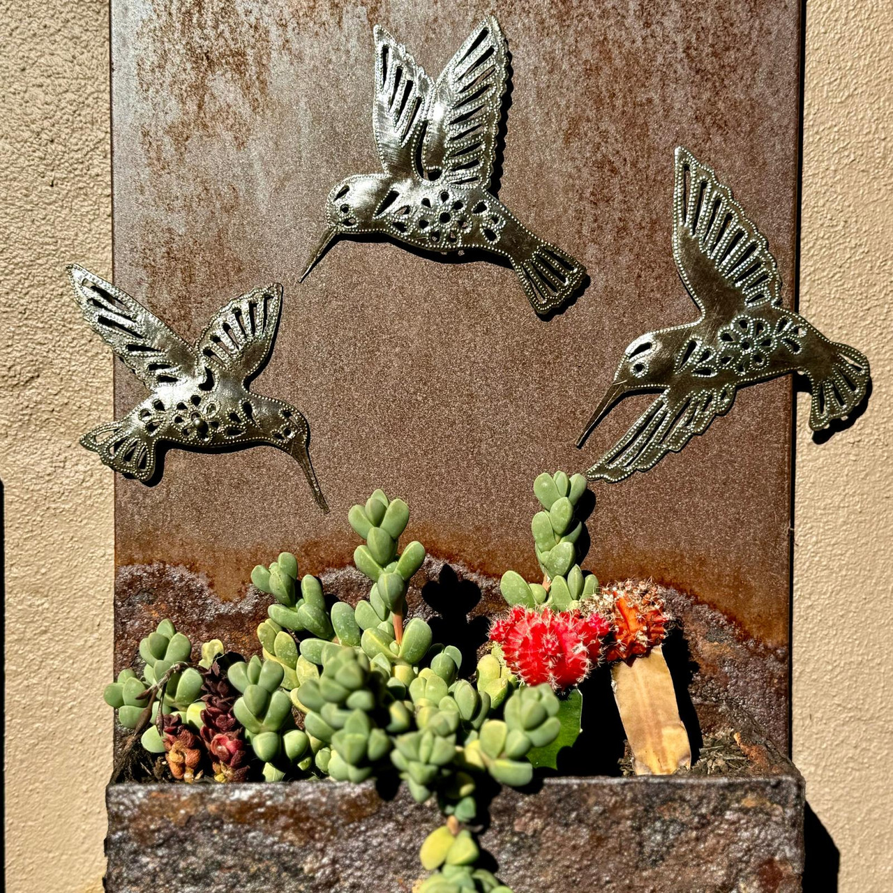 handmade decorative hummingbirds, cutout bird wall art, fair trade home decor, handmade bird decorations, artisan wall art, nature-inspired home accents