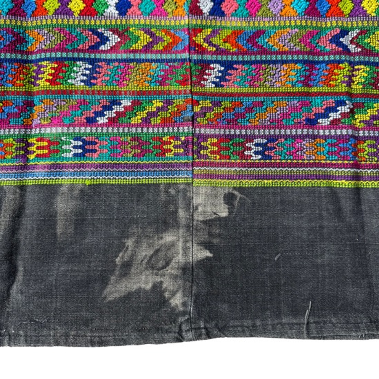 Vintage Guatemalan Huipil from San Juan Comalapa faded Black background