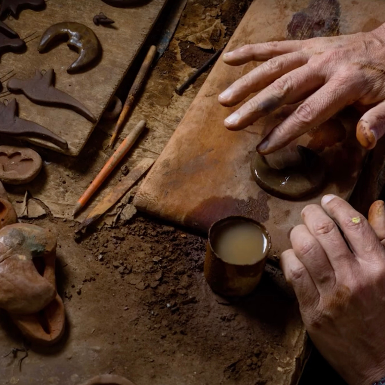 Jose Arriola makes light-hearted decorative pieces like this hummingbird mobile. He makes and paints each bird by hand, firing them in a traditional wood kiln.