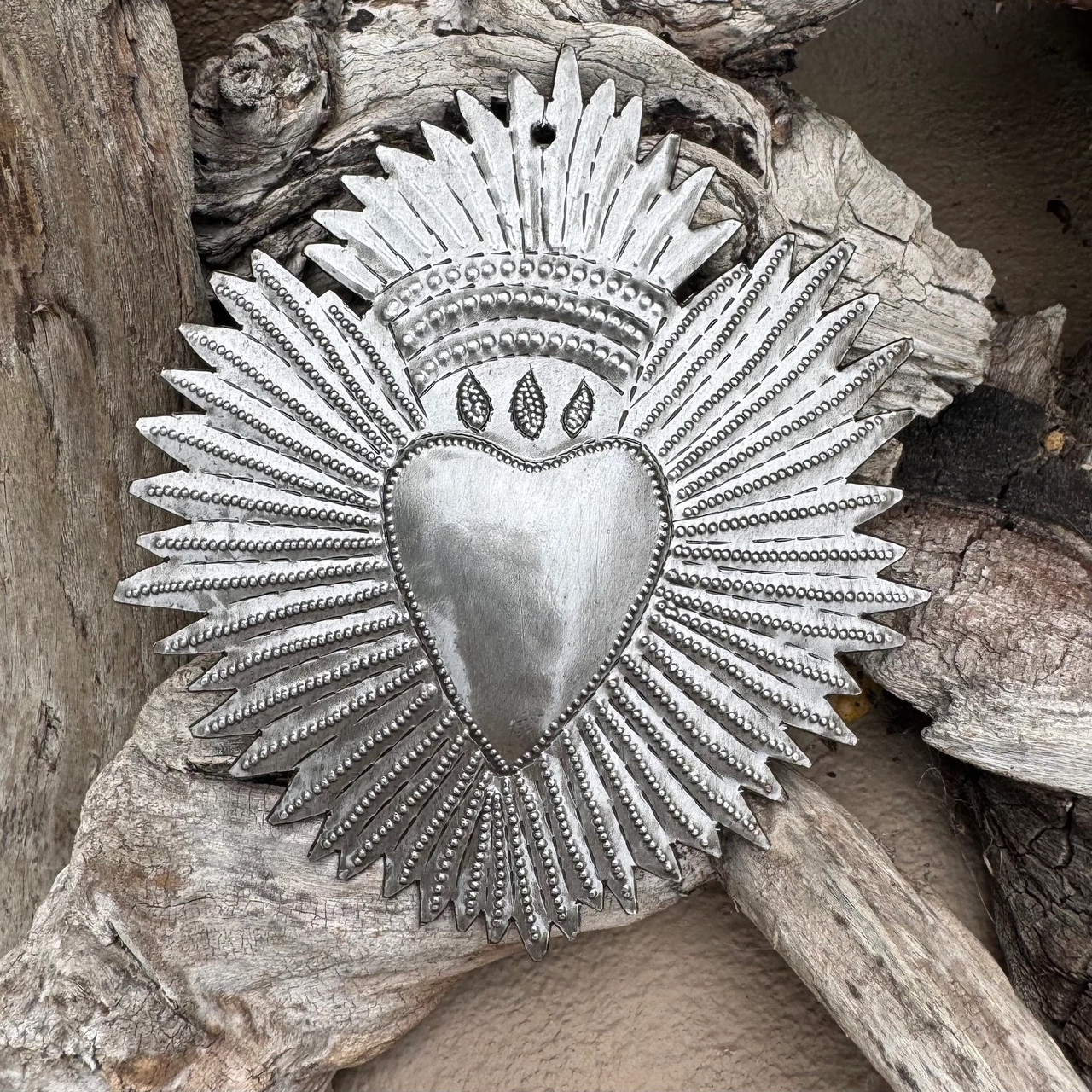 Haitian metal art, recycled steel heart, fair trade wall décor, handmade metal sculpture, Haitian heart wall art, eco-friendly home décor, hand-hammered steel art