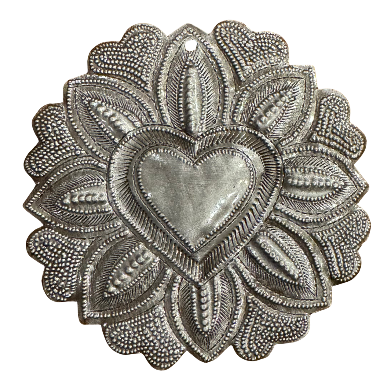 haitian sacred heart metal decor

handmade milagro heart ornament

sacred heart with flowers haiti