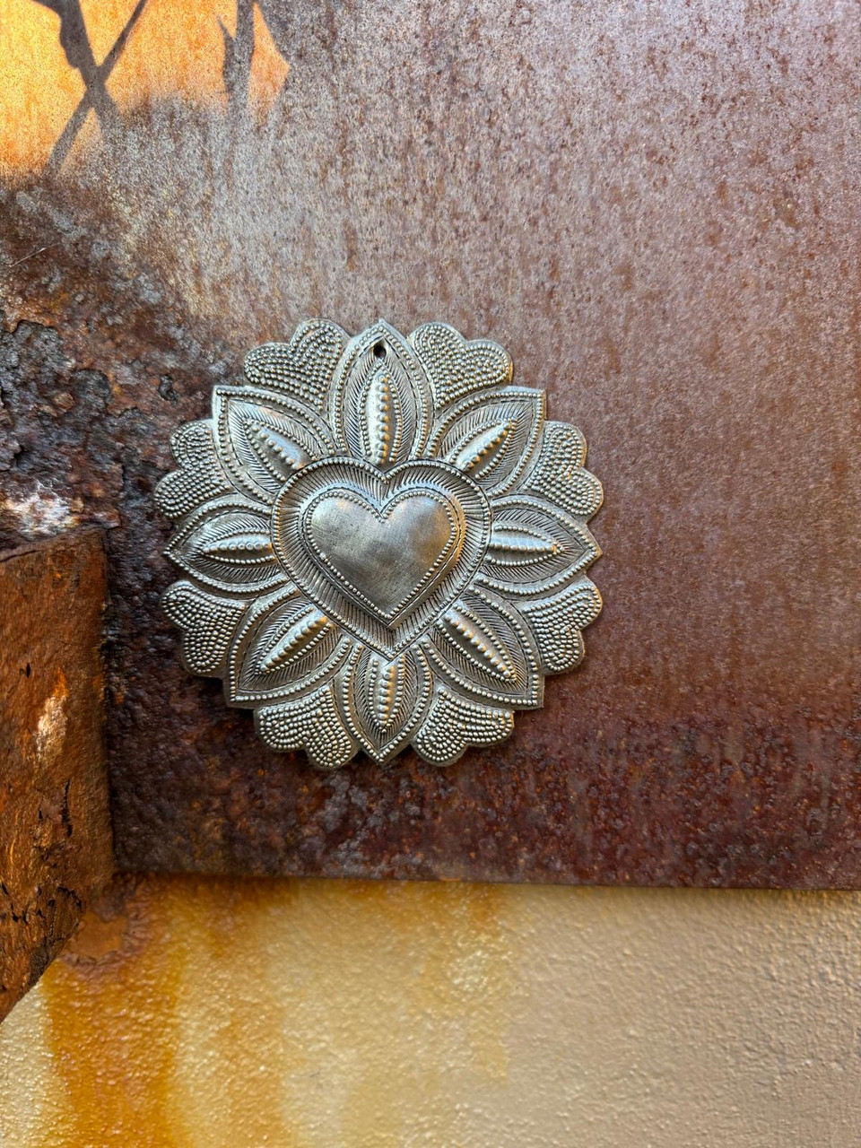 ethical handmade gift from haiti

artisan crafted sacred heart ornament

friendship heart milagro keepsake