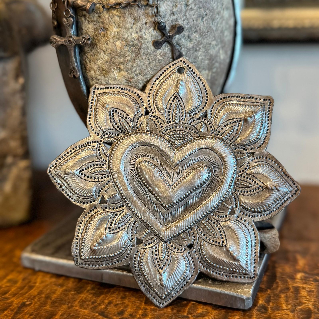 sacred heart decor for healing and support

handmade spiritual heart haiti artisan

small sacred heart metal gift