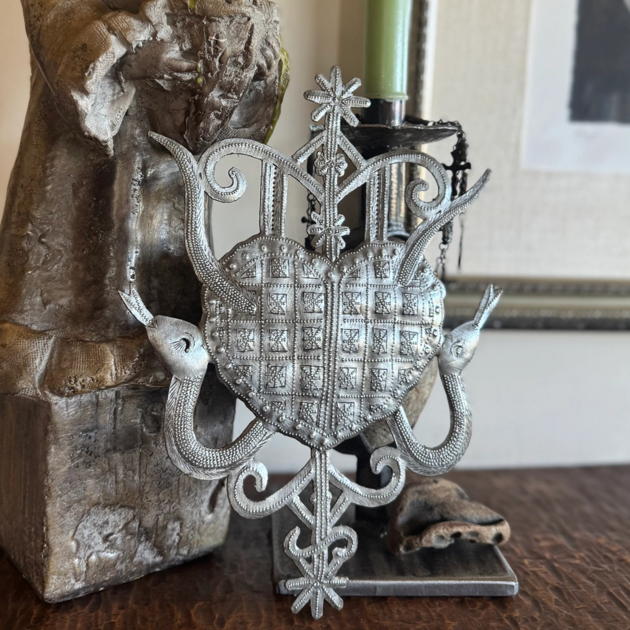 Damballa, the cosmic serpent of wisdom and creation, symbolizing life force, purity, and spiritual continuity.