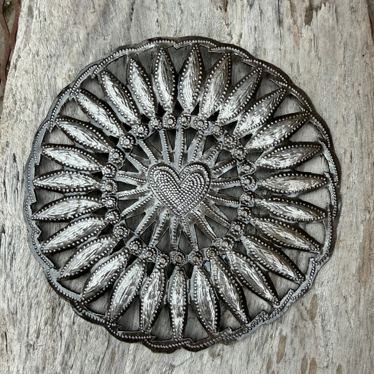floral heart wall art
petal heart decor
mandala heart wall art
Haitian metal art