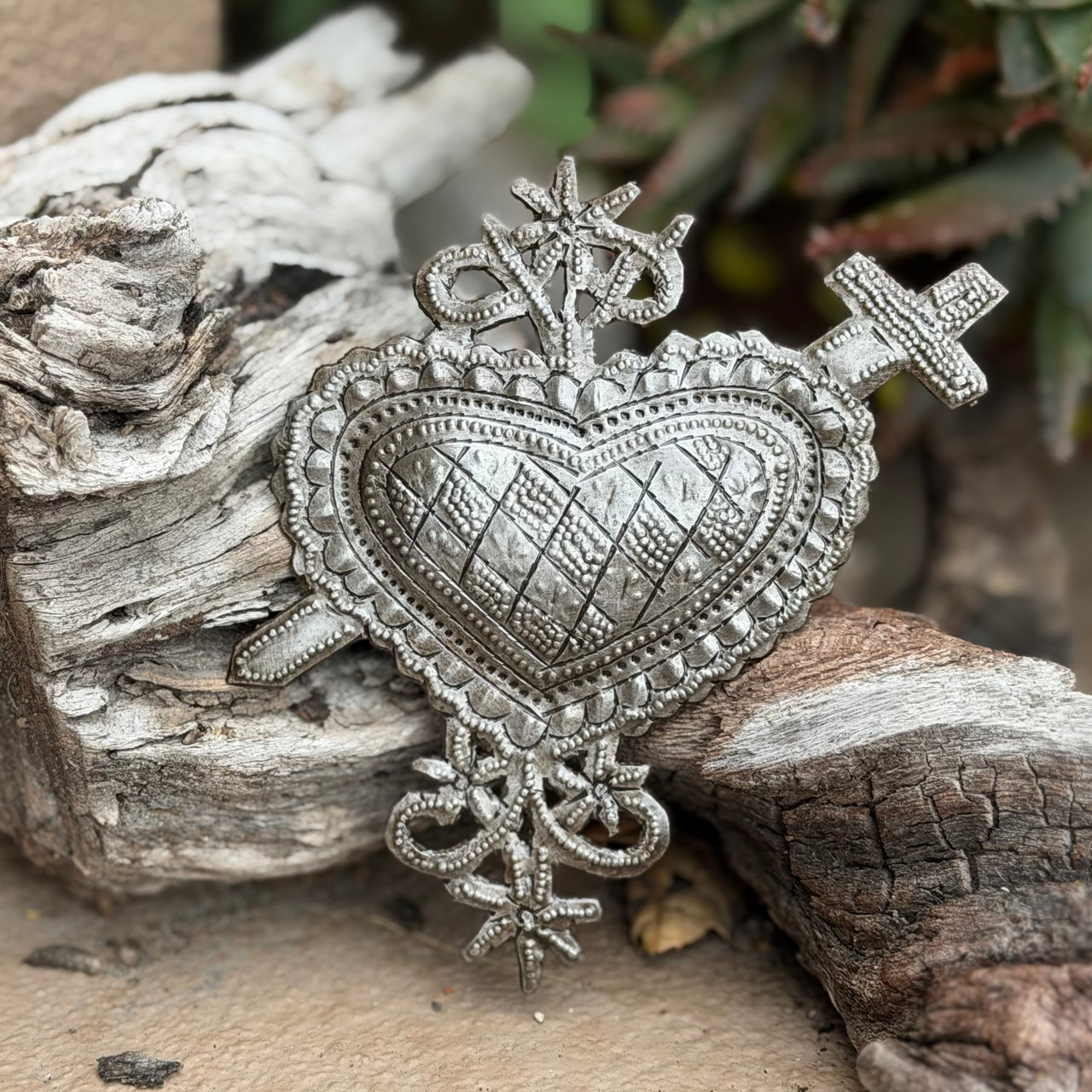 Haitian metal art
spiritual wall art
protection symbol decor
folk art Haiti
handmade metal heart