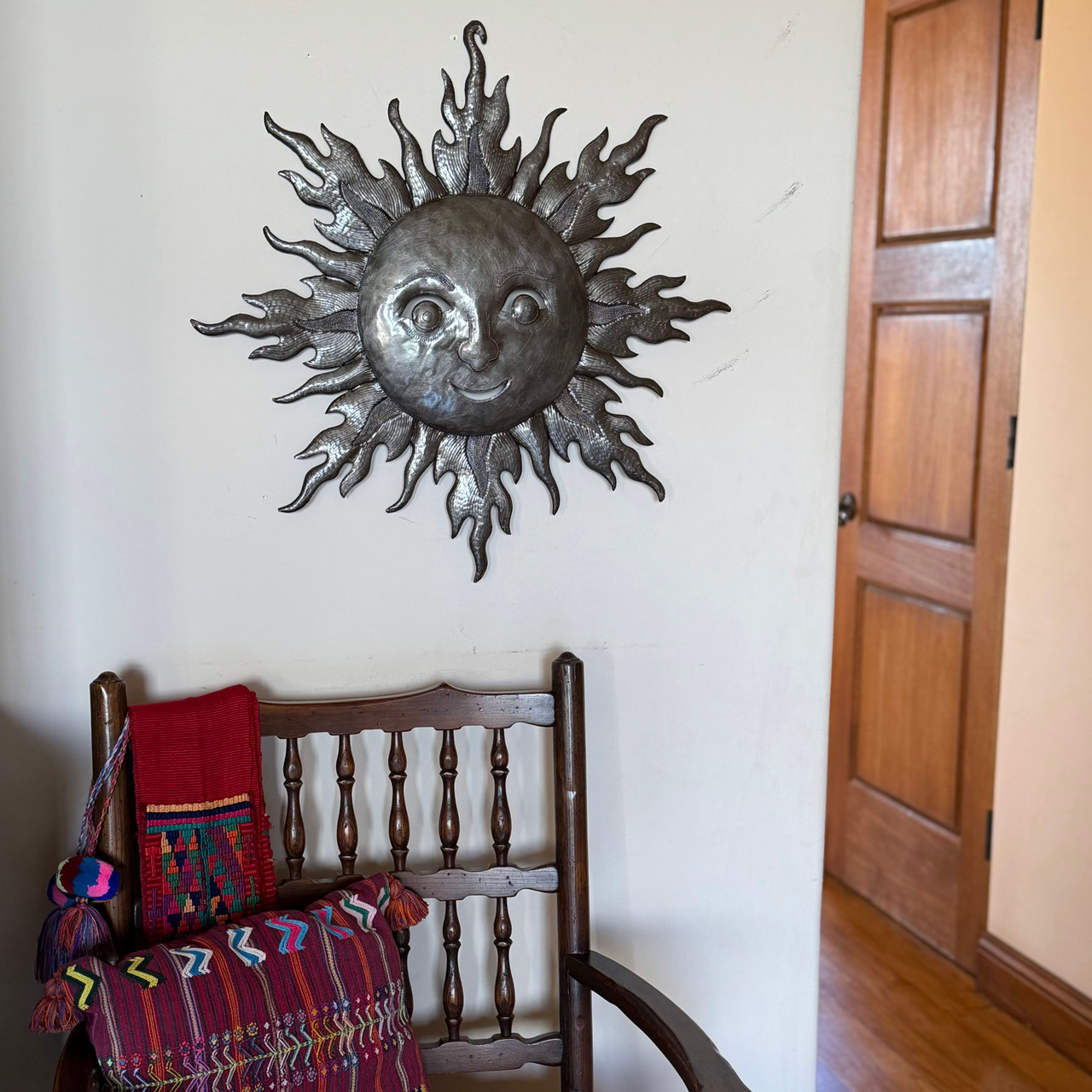 artisan metal artwork, outdoor metal sun decor, Haitian folk art, handmade sun face wall art