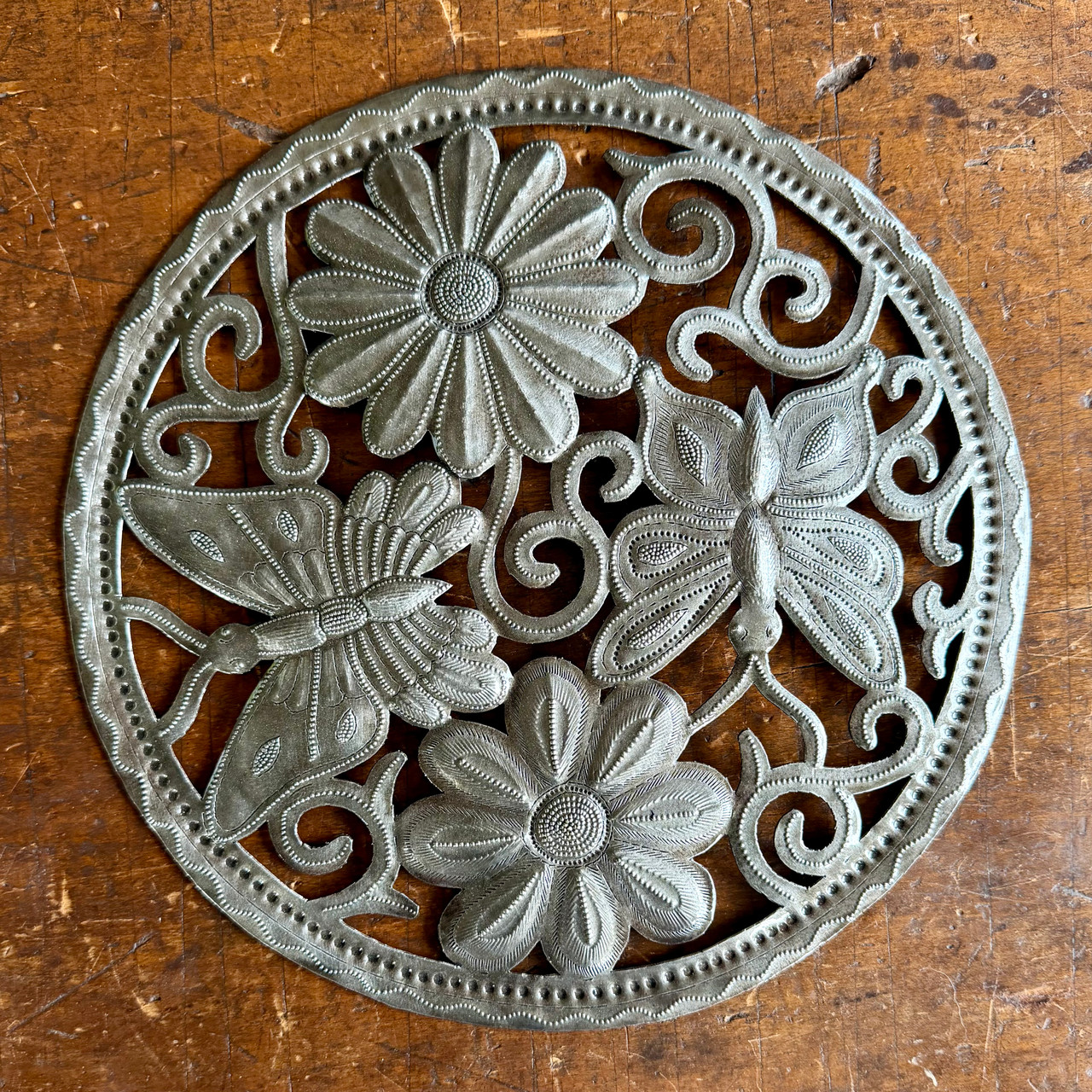 recycled steel art, Haitian recycled metal art, handmade Haiti art, Caribbean folk art, tropical wall decor, garden decor, round metal wall art, floral wall sculpture, butterfly gift