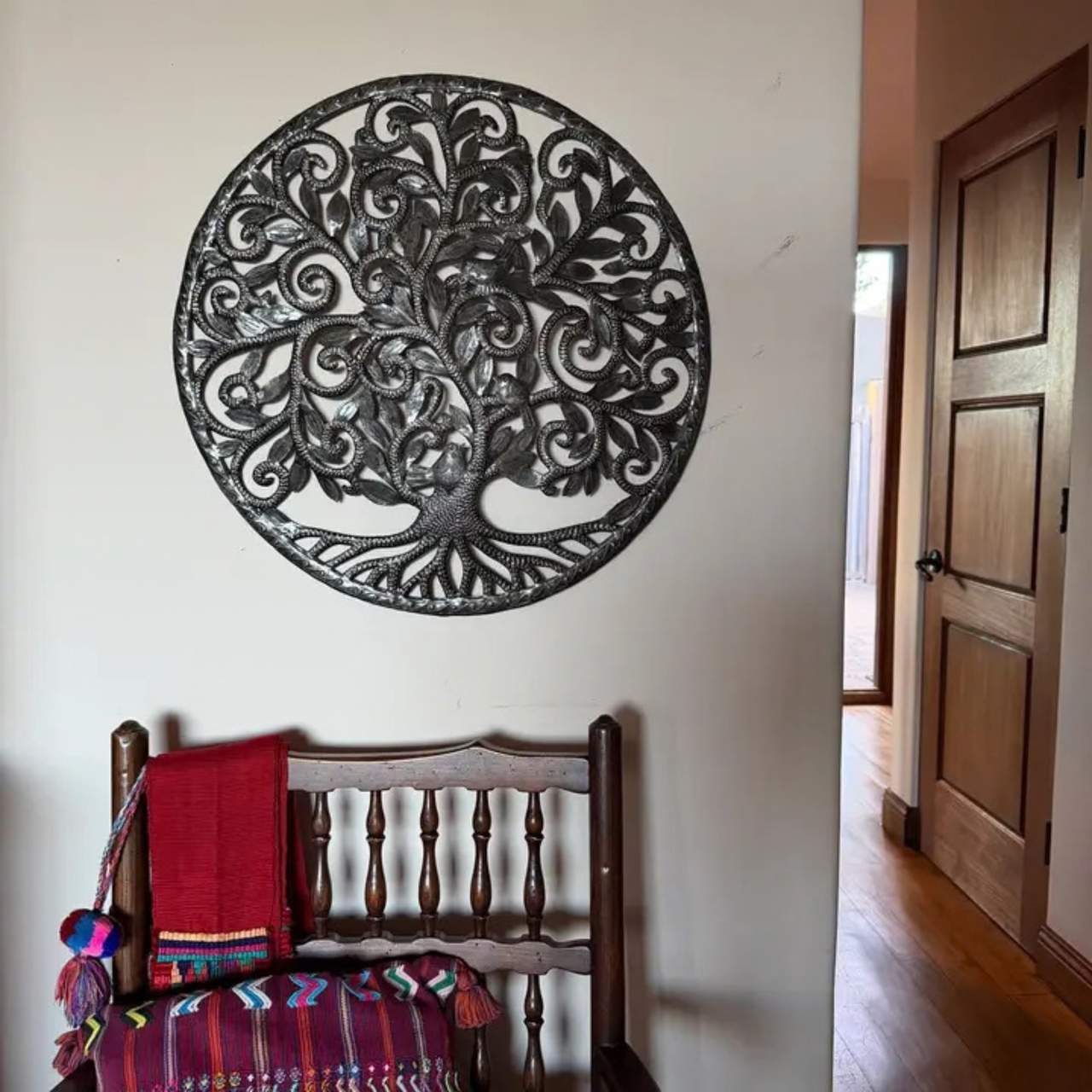RECYCLED STEEL TRANSFORMED INTO ART
Recycled steel oil drums are transformed by hand into decorative metal artwork. Look closely to discover individually worked branches, leaves, curls and roots, with subtle artisan variations making each sculpture distinctive.