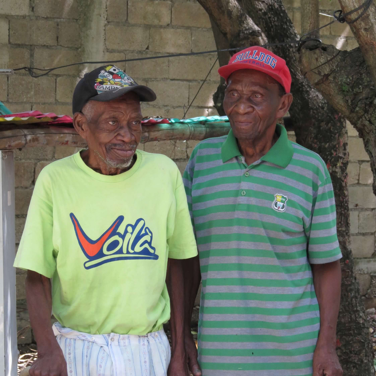 Haitian artist at home Gerard Fortune, Unique Painting, Unique Haitian Painting,