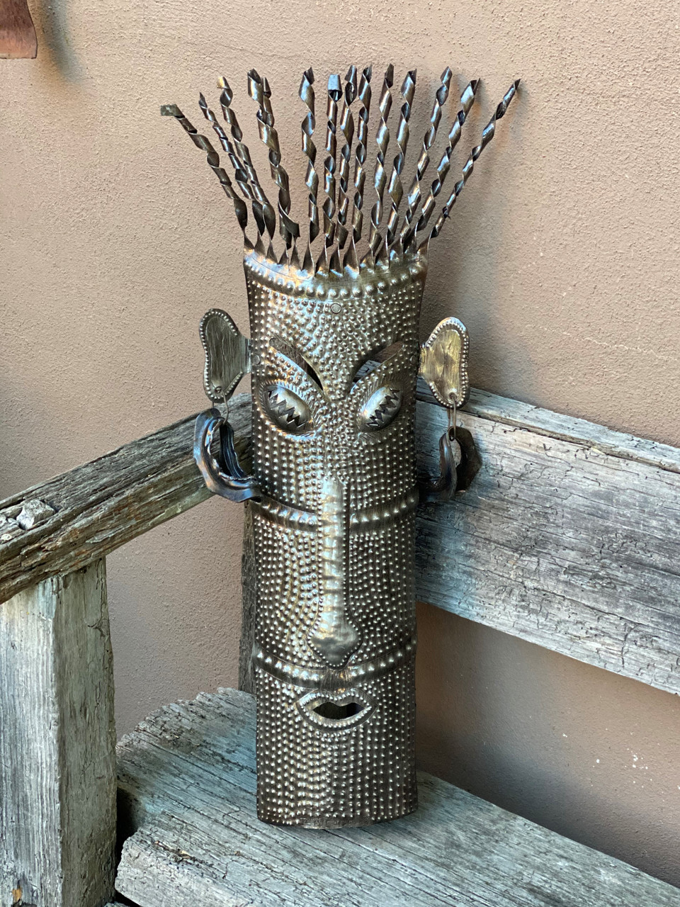 Made from recycled steel, eco-conscious folk art