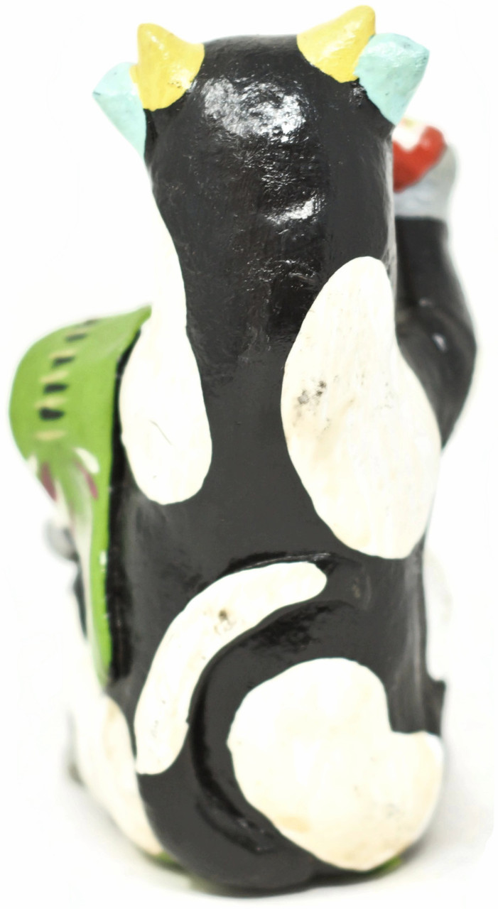handmade Mexican ceramics, whimsical cow sculpture, cow drinking soda, colorful pottery, artisan ceramic sculpture