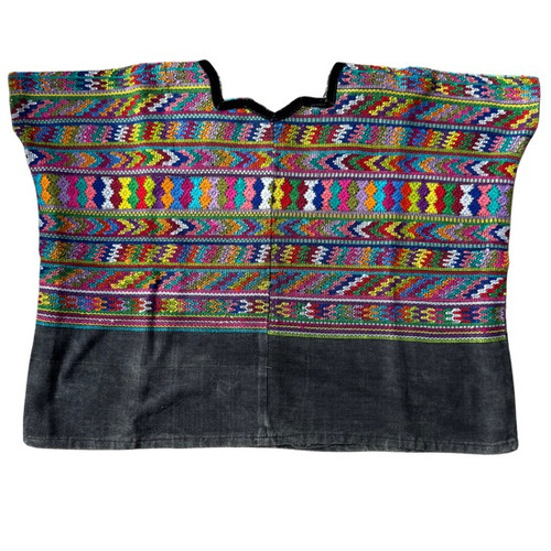 Vintage Guatemalan Huipil from San Juan Comalapa faded Black background