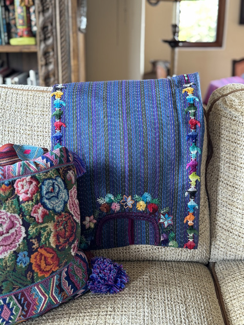 Handwoven Guatemalan Huipil – Lake Atitlán Region
This is a new, authentic huipil handwoven by artisans from around Lake Atitlán, Guatemala. It features a beautiful floral design around the neckline and a bird motif connecting the three woven panels—a traditional detail that makes this piece both unique and culturally rich.
Material: 100% cotton
Measurements: 28" wide x 28" long
Neck opening: 19"
✨ Note on fit: Guatemalan huipils are traditionally woven with smaller neck openings. If the neckline feels too snug, you can simply cut a small slit along the shoulder side and finish it by embroidering the edges. This is a technique often used by Guatemalan women on their own huipils.
This piece can be worn as a blouse, tunic, or statement top, or even displayed as a textile art piece in your home. A true example of Mayan artistry and heritage!