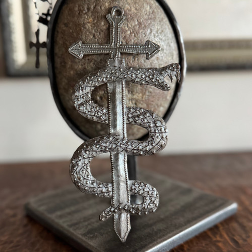 Haitian metal sculpture, Vodou symbolism, balance of strength and wisdom