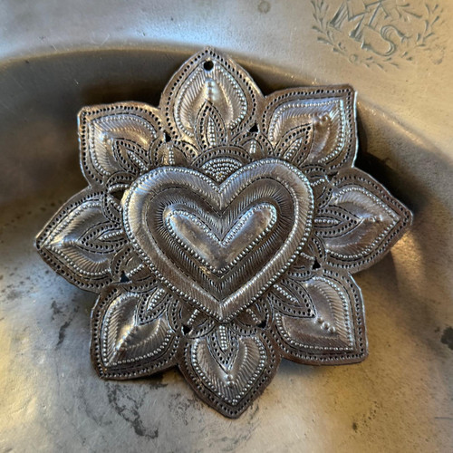 haitian sacred heart metal decor

handmade milagro heart ornament

sacred heart with flowers haiti