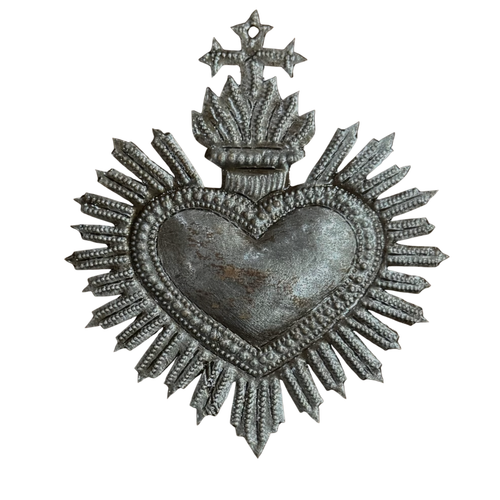 sacred heart decor for healing and support

handmade spiritual heart haiti artisan

small sacred heart metal gift
