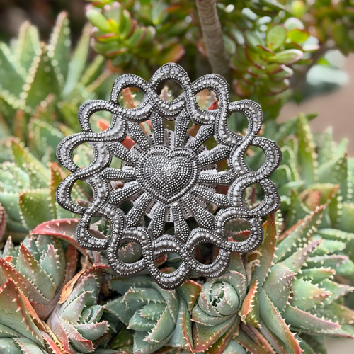 sunburst heart wall art
milagro heart decor
sacred heart wall decor