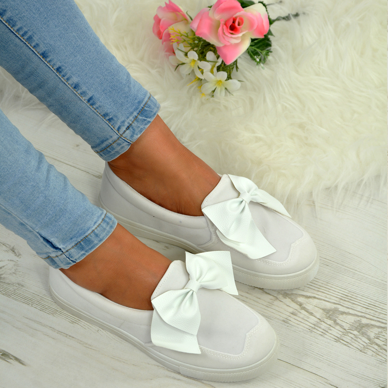 white bow trainers