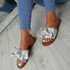 Nerva Silver Bow Flat Sandals