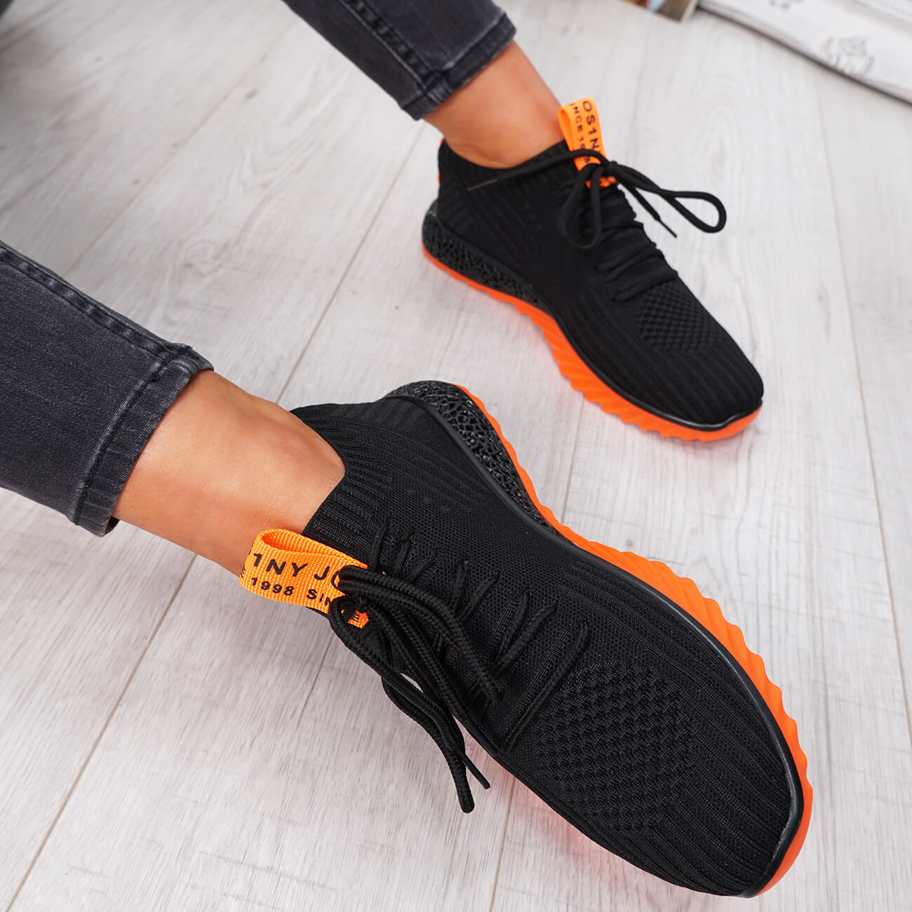 orange running trainers