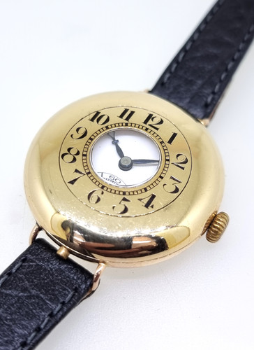 9ct gold Swiss Demi-Hunter wristwatch.