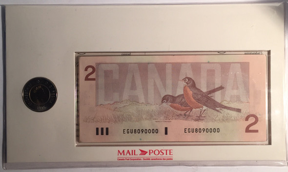 Canada: 1996 $2 Uncirculated Toonie Coin, Banknote and Stamp Set Canada: 1996 $2 Uncirculated Toonie Coin, Banknote and Stamp Set