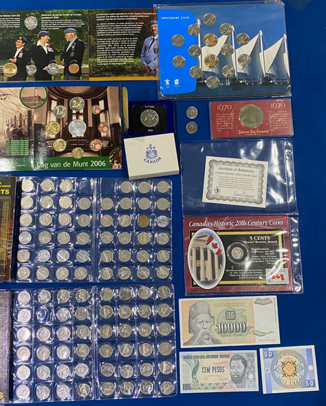 World Coin / Banknote Lot Bulk Estate Lot 11. Includes one Silver Coin.