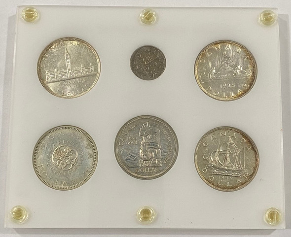 Canada: 1935 - 1964 Commemorative Silver Dollar Collection Lot (5 Pieces) Canada: 1935 - 1964 Commemorative Silver Dollar Collection Lot (5 Pieces)