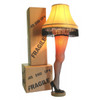 Christmas Story leg lamp shining brightly in front of shipping cartons.
