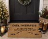 Front door decorated with Die Hard Christmas Movie Doormat