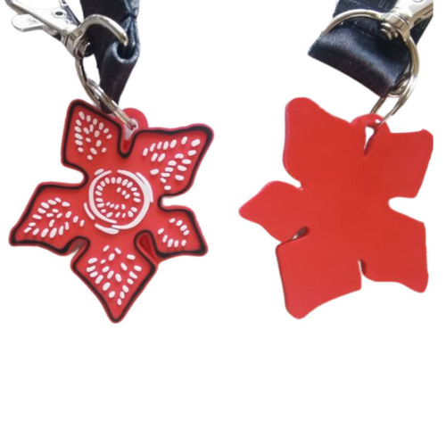 Stranger Things Dr. Brenner Lanyard and Rubber Charm - Front and Back view of rubber charm