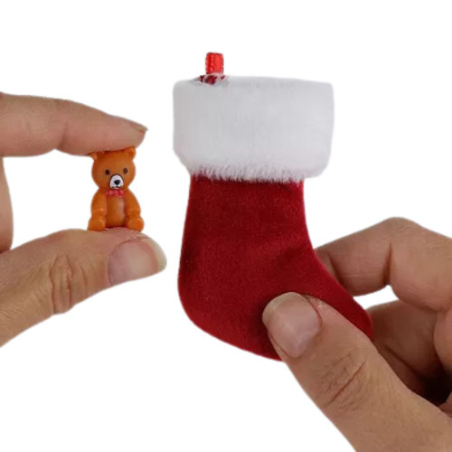https://cdn11.bigcommerce.com/s-c9a80/images/stencil/500x659/products/17958/67685/Worlds_Smallest_Stocking_with_Mini_Toy__66664.1699730299.jpg?c=2