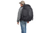 Man wearing Kelty Redwing 50 Tactical backpack, as seen from behind