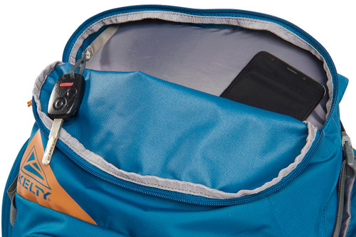 Close up of Kelty Redwing 50 backpack, showing small top pocket unzipped