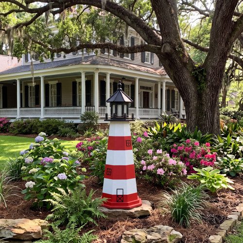 Southern home landscape with Assateague replica lighthouse.