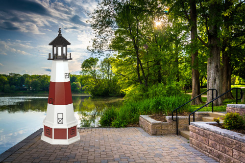 Montauk, NY replica poly garden lighthouse on lakeshore patio