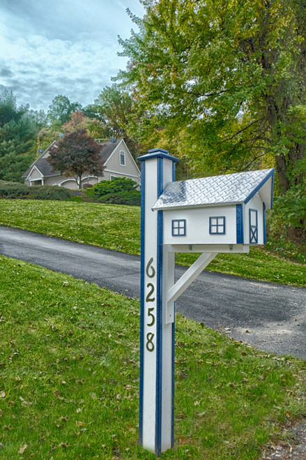 Amish crafted poly mailbox with aluminum roof adds beauty and curbside appeal to home in background
