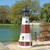 Recycled poly lumber Montauk lighthouse replica on lake shore.